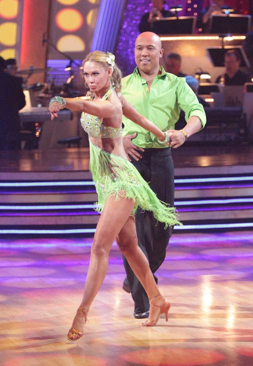 Hines Ward and his partner Kym Johnson dance a...