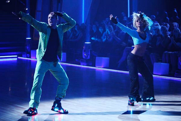 Chelsea Kane and her partner Mark Ballas dance a...