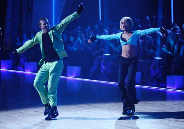 Chelsea Kane and her partner Mark Ballas dance a...