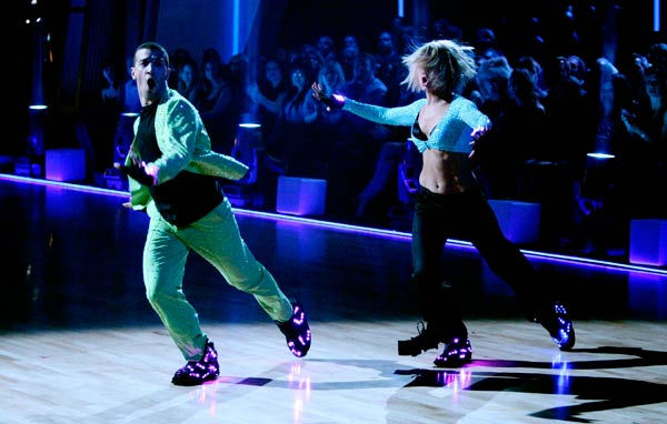 Chelsea Kane and her partner Mark Ballas dance a...