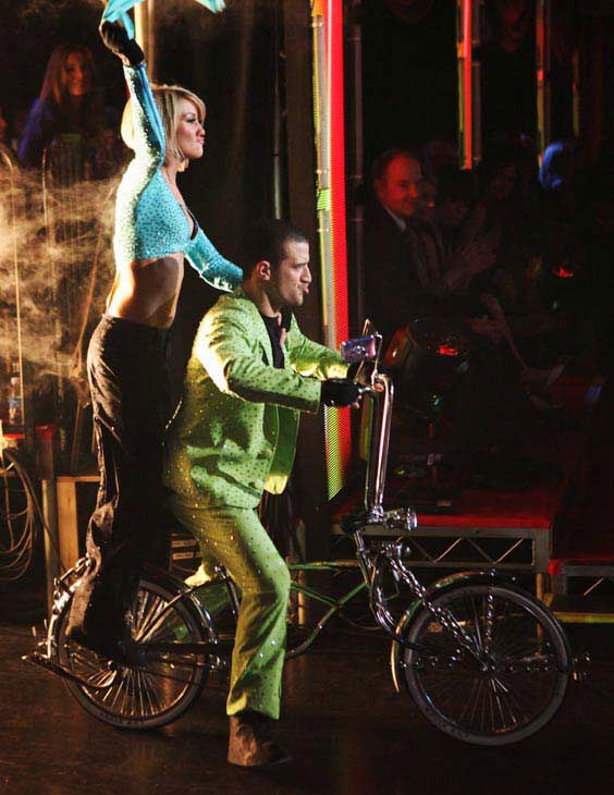 Chelsea Kane and her partner Mark Ballas dance a...