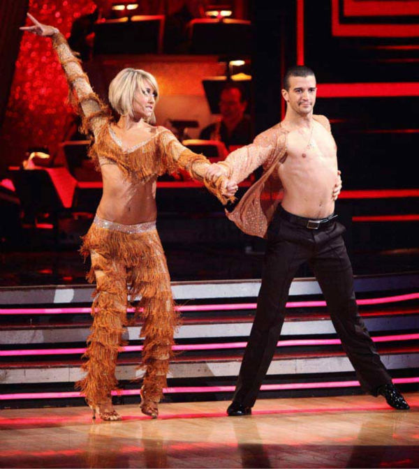 Chelsea Kane and her partner Mark Ballas dance a...
