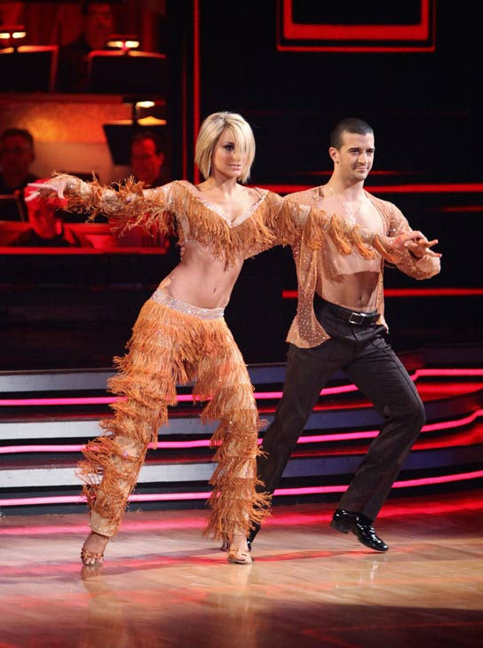 Chelsea Kane and her partner Mark Ballas dance a...