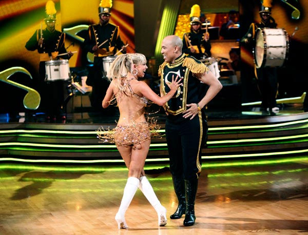 Hines Ward and his partner Kym Johnson dance a...