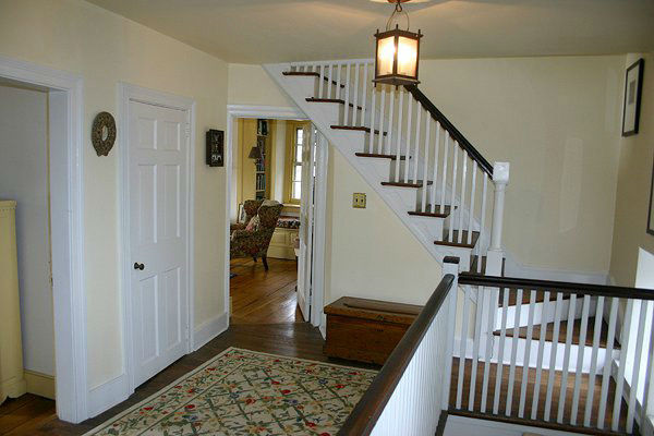 The stairway in the five-bedroom home featured...