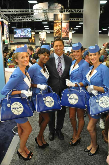 On The Red Carpet host Chris Balish poses with...