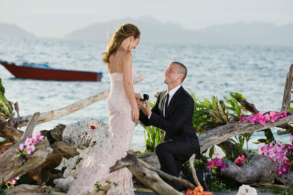 Ashley Hebert and J.P. appear in a scene from...