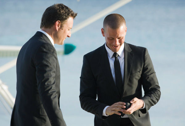 J.P. and Chris Harrison appear in a scene from...