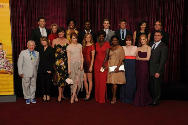Members of the cast gather for a portrait at the...