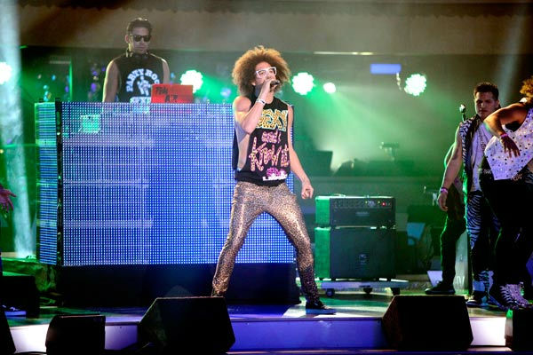 Pop group LMFAO performed their hit single,...