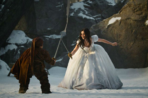 Lily Collins appears in a scene from 'Mirror,...