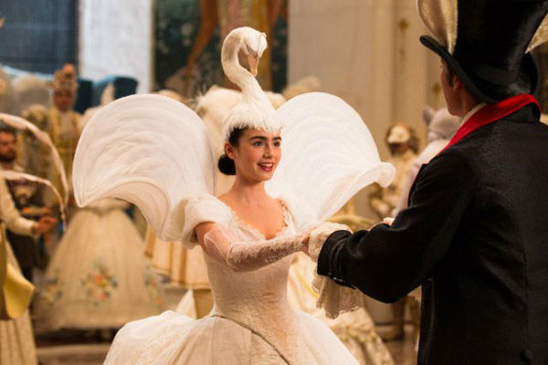 Lily Collins and Armie Hammer appear in a scene...