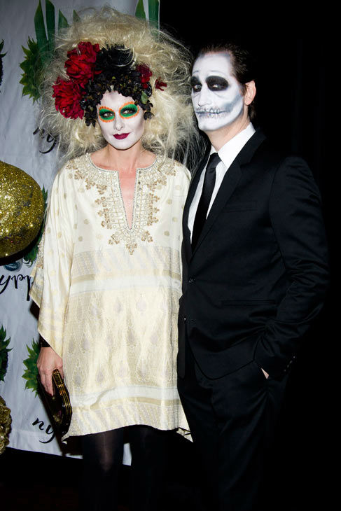 Debra Messing and Daniel Zelman attend Bette...