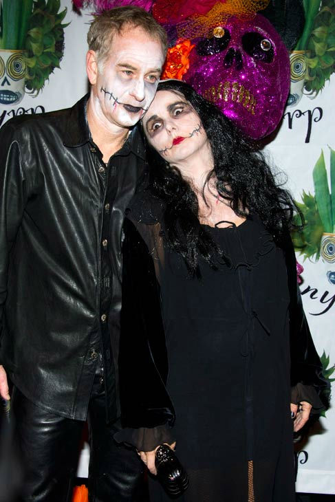 John McEnroe and Patty Smyth attend Bette Midler's Hulaween gala benefit for the New York Restoration Project, in New York, Friday, Oct. 28, 2011.