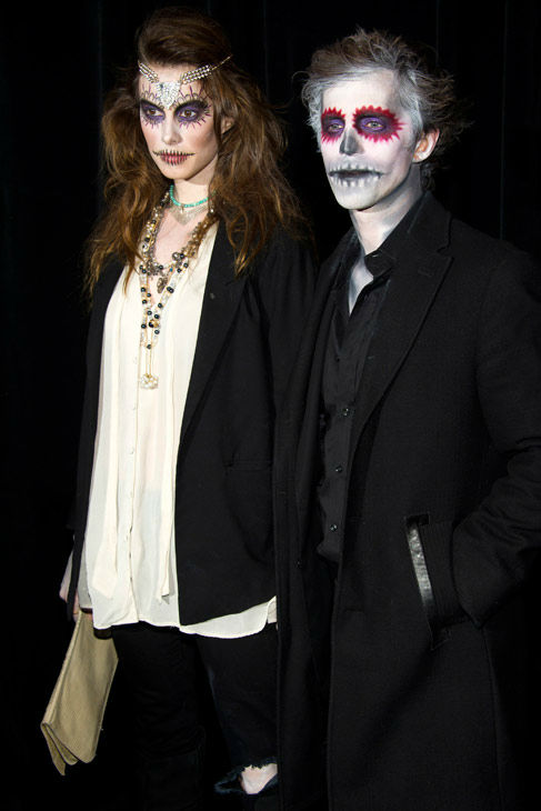 Model Elettra Wiedemann and guest attend Bette Midler's Hulaween gala benefit for the New York Restoration Project, in New York, Friday, Oct. 28, 2011.
