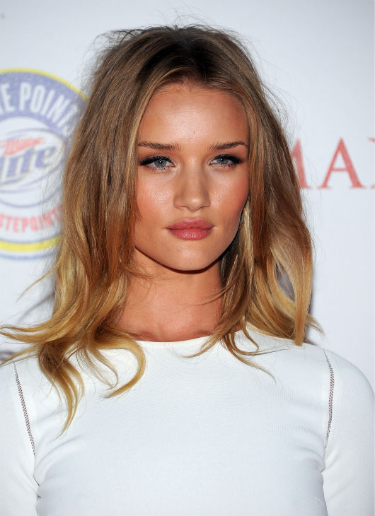 Actress Rosie Huntington-Whiteley arrives at the...
