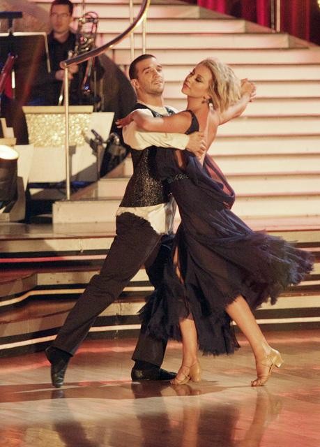Chelsea Kane and her partner Mark Ballas dance a...