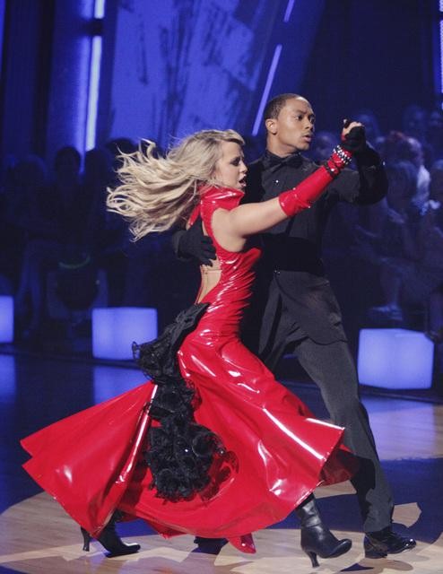 Romeo and his partner Chelsie Hightower dance a...