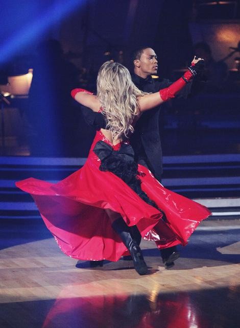 Romeo and his partner Chelsie Hightower dance a...