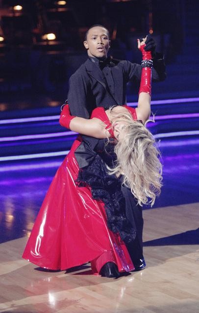 Romeo and his partner Chelsie Hightower dance a...