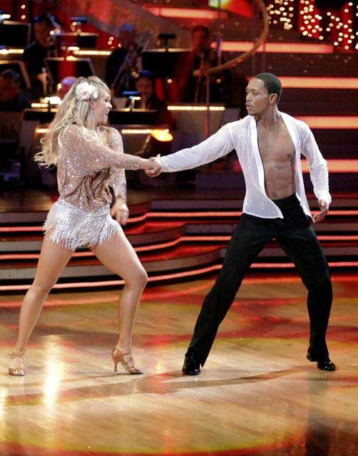 Romeo and his partner Chelsie Hightower dance a...