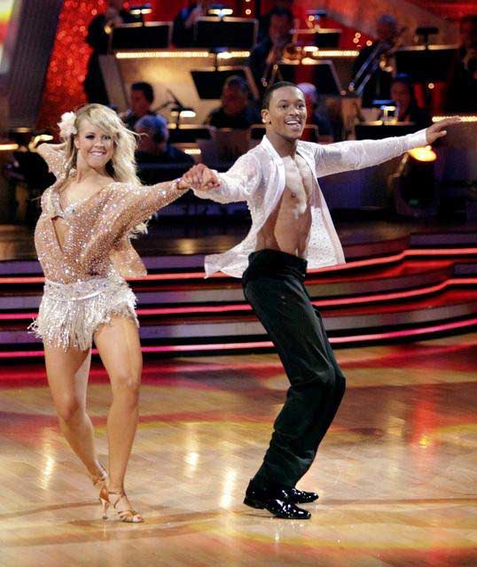 Romeo and his partner Chelsie Hightower dance a...