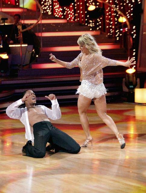 Romeo and his partner Chelsie Hightower dance a...