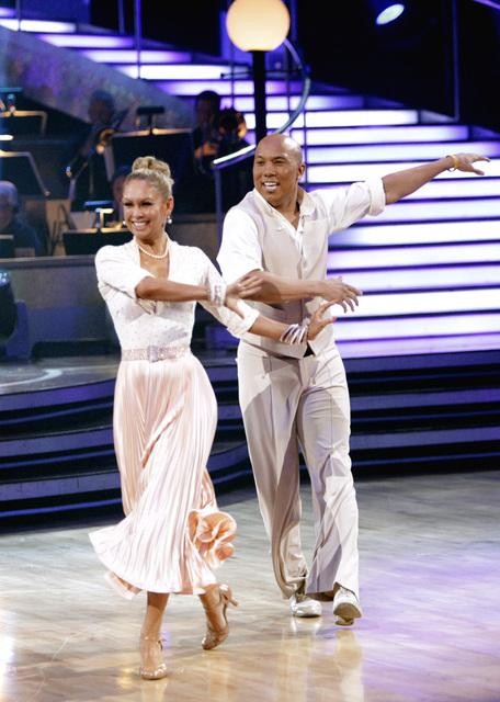 Hines Ward and his partner Kym Johnson dance a...