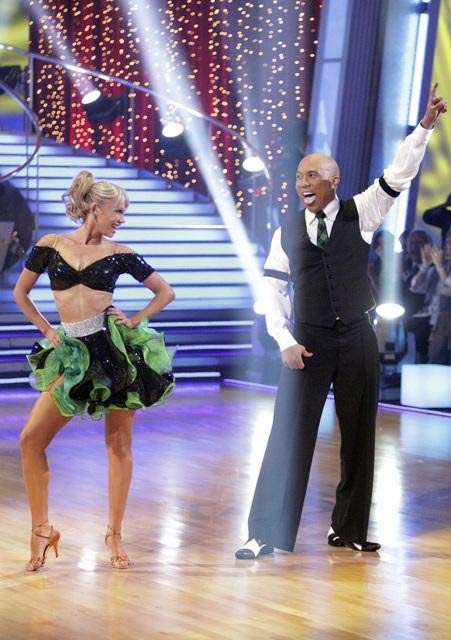 Hines Ward and his partner Kym Johnson dance a...