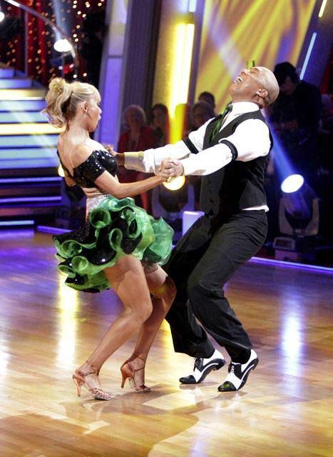 Hines Ward and his partner Kym Johnson dance a...