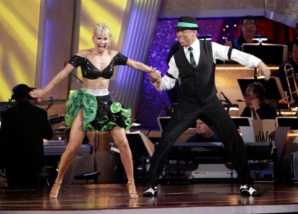Hines Ward and his partner Kym Johnson dance a...