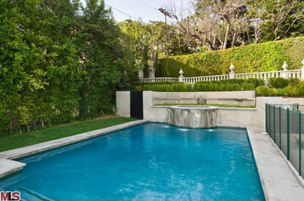 Katy Perry and Russell Brand's Los Angeles home. The four-bedroom, four and a half-bathroom house is 4,700 square feet and was put on the market in the spring of 2011 for $3.3 million.