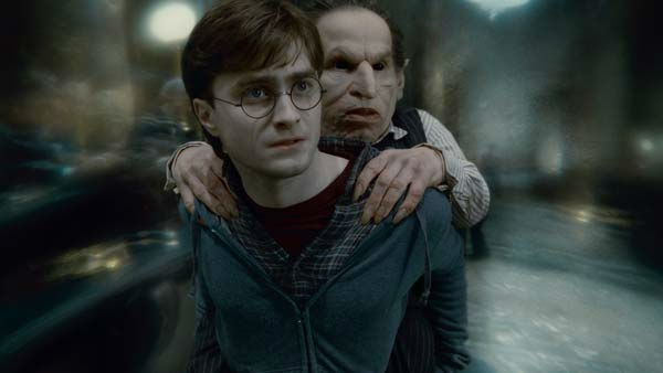 Harry Potter (Daniel Radcliffe) and Griphook...