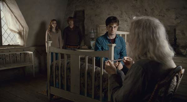 Hermione Granger (Emma Watson), Ron Weasley (Rupert Grint), Harry Potter (Daniel Radcliffe) and Ollivander (John Hurt) appear in a scene from the 2011 film 'Harry Potter and the Deathly Hallows - Part 2.'