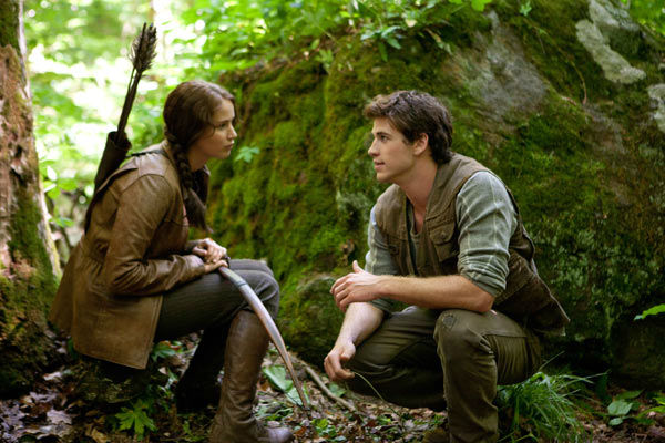 Jennifer Lawrence and Liam Hemsworth appear in a scene from 'The Hunger Games.'