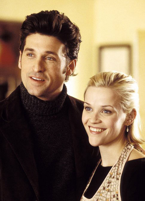 Reese Witherspoon and Patrick Dempsey appear in...