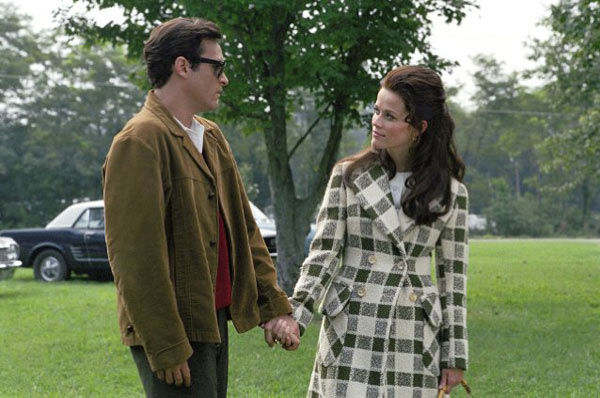Joaquin Phoenix and Reese Witherspoon appear in...