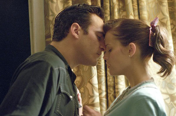 Joaquin Phoenix and Reese Witherspoon appear in...