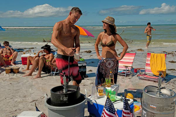 Channing Tatum and Olivia Munn appear in a still...