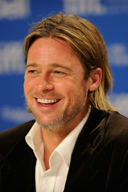 Actor Brad Pitt participates in a news...