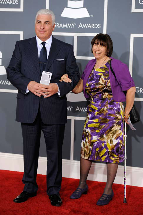 Mitch, left, and Janis Winehouse arrive at the...