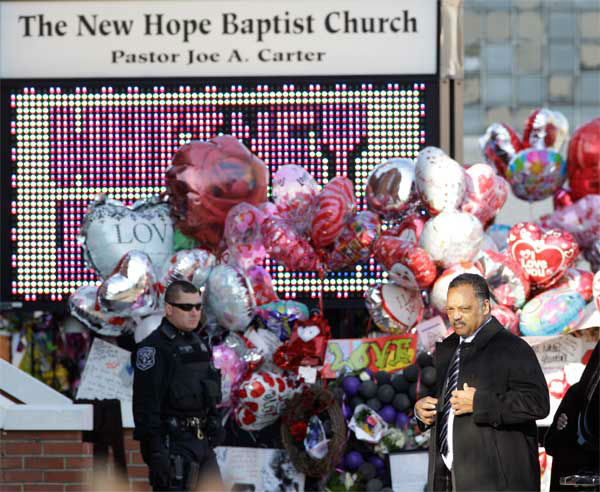 Rev. Jesse Jackson arrives at the New Hope...