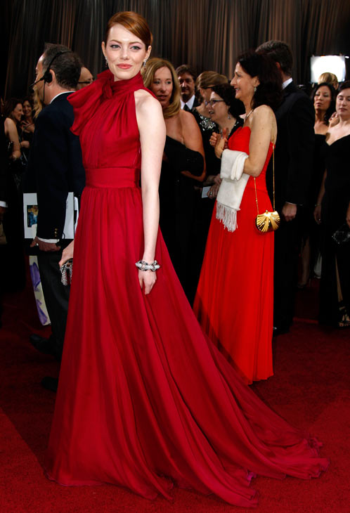 Actress Emma Stone arrives before the 84th Academy Awards on Sunday, Feb. 26, 2012, in the Hollywood section of Los Angeles.