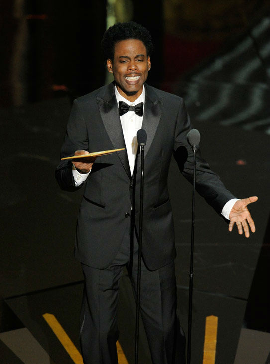 Chris Rock presents an award onstage during the...