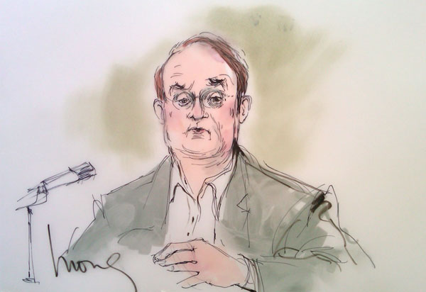 Marc Cherry appears inside a Los Angeles court...