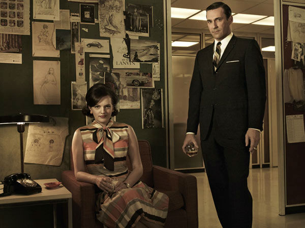 Elisabeth Moss (Peggy Olson) and Jon Hamm (Don...