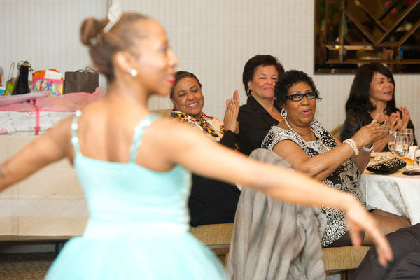 Aretha Franklin watches a dancer perform at her...