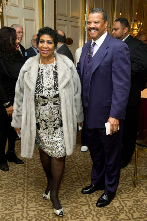 Aretha Franklin and boyfriend William Wilkerson arrive to her seventieth birthday party in New York, Saturday, March 24, 2012.
