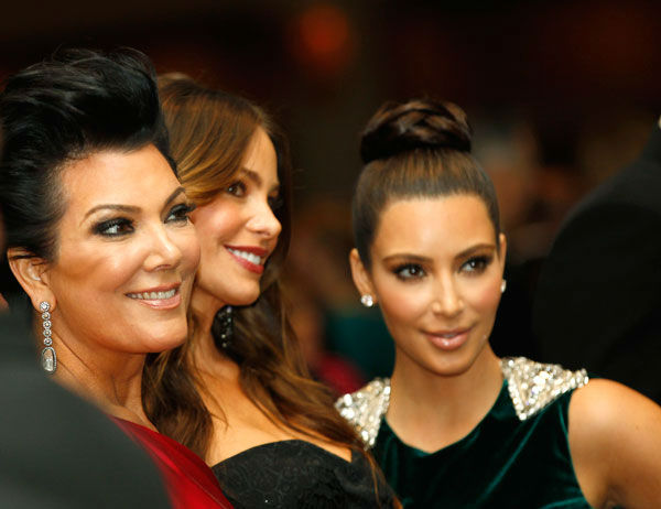 Kris Jenner left with Sofia Vergara center and Kim Kardashian during the