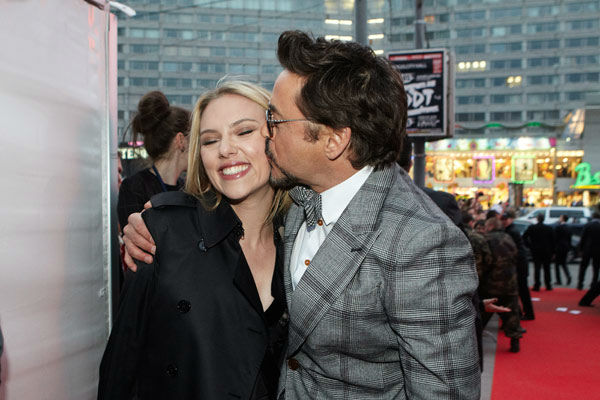 Robert Downey, Jr. and Scarlett Johansson attend...